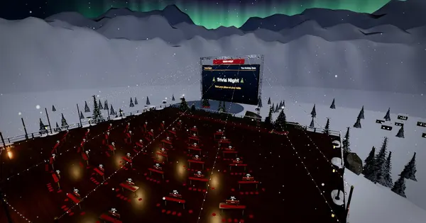 Team tables on the snowy terrace, facing the big screen